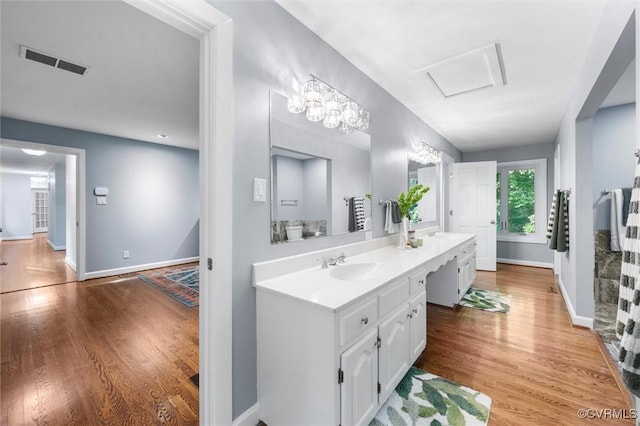 3640 Michaux Mill Dr, Powhatan, VA 23139 - full bath with double vanity and wood finished floors
