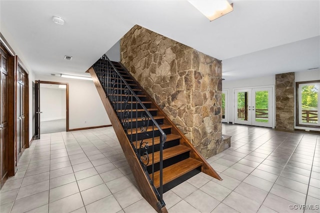 3640 Michaux Mill Dr, Powhatan, VA 23139 - staircase featuring french doors and tile patterned floors