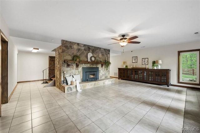 3640 Michaux Mill Dr, Powhatan, VA 23139 - unfurnished living room with tile patterned flooring, a ceiling fan, and a fireplace