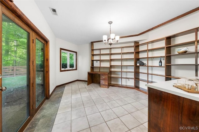 3640 Michaux Mill Dr, Powhatan, VA 23139 - unfurnished dining area featuring a chandelier, light tile patterned floors, and baseboards