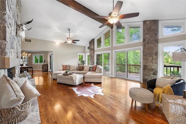 3640 Michaux Mill Dr, Powhatan, VA 23139 - living area featuring ceiling fan, wood finished floors, beam ceiling, high vaulted ceiling, and a chandelier