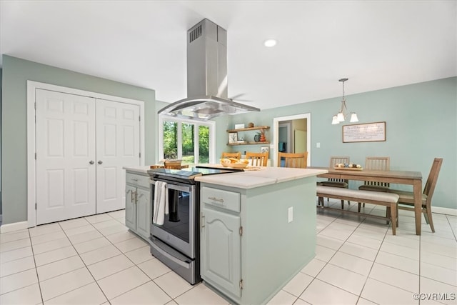 3640 Michaux Mill Dr, Powhatan, VA 23139 - kitchen featuring island exhaust hood, electric stove, a chandelier, light countertops, and light tile patterned floors