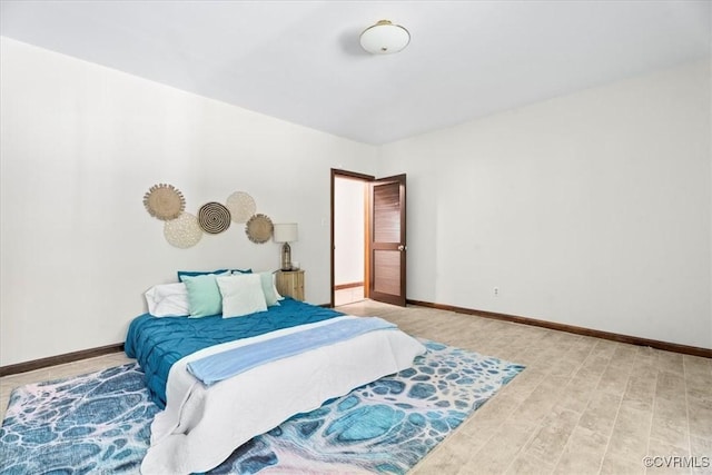 3640 Michaux Mill Dr, Powhatan, VA 23139 - bedroom with baseboards and light wood-style flooring