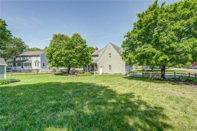 view of yard with fence