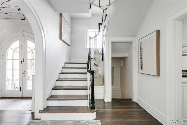 7 River Rd, Richmond, VA 23226 - stairs featuring arched walkways, wood finished floors, and baseboards