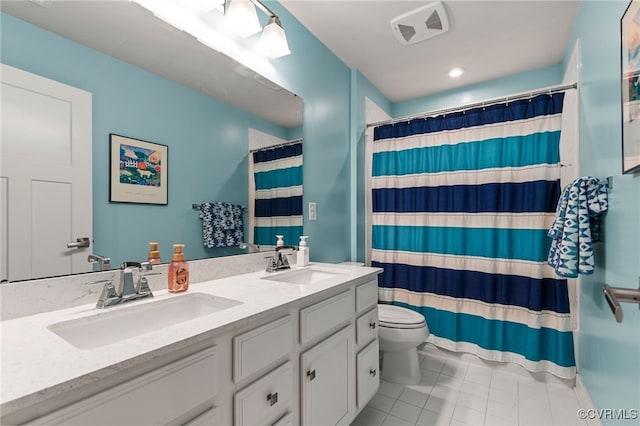 full bath featuring toilet, visible vents, a sink, and tile patterned flooring