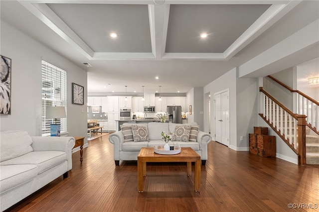 living area with recessed lighting, dark wood finished floors, stairs, and visible vents