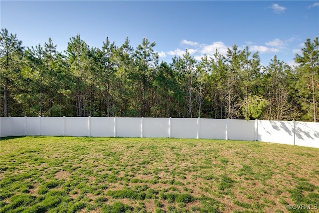 view of yard featuring a fenced backyard