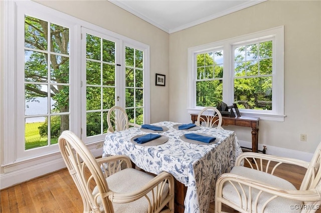 510 Cedar Ln, Hopewell, VA 23860 - dining space with crown molding, light wood-type flooring, and baseboards