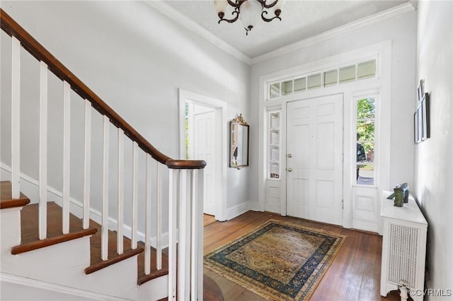 510 Cedar Ln, Hopewell, VA 23860 - entryway featuring stairway, hardwood / wood-style floors, ornamental molding, and a chandelier