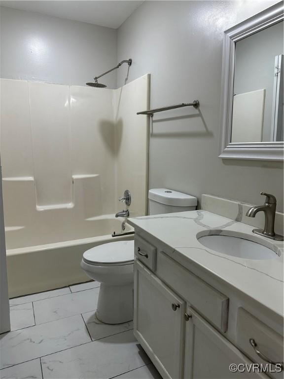 1916 Boardman Ln, Henrico, VA 23238 - bathroom featuring toilet, tub / shower combination, vanity, and marble look tiles