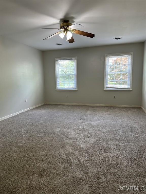1916 Boardman Ln, Henrico, VA 23238 - spare room featuring plenty of natural light, ceiling fan, and baseboards
