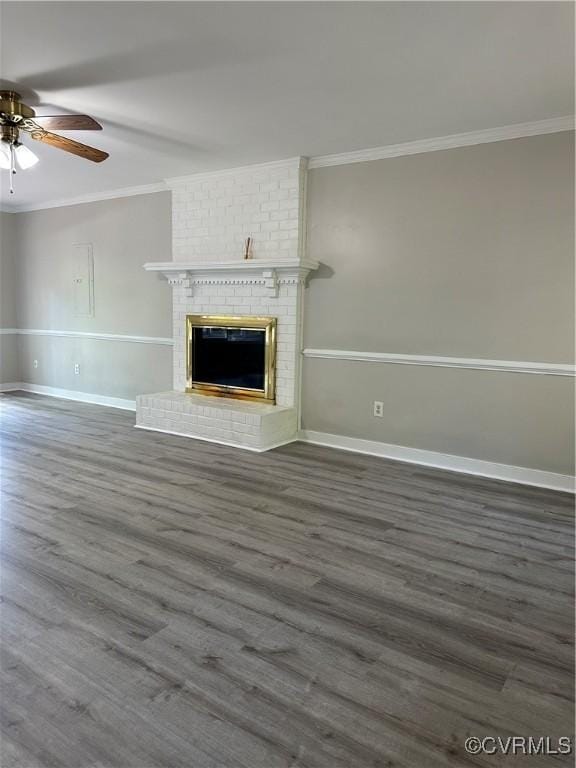 1916 Boardman Ln, Henrico, VA 23238 - unfurnished living room with crown molding, ceiling fan, wood finished floors, baseboards, and a brick fireplace