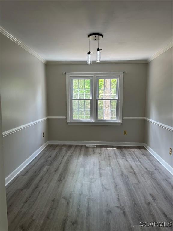 1916 Boardman Ln, Henrico, VA 23238 - empty room featuring wood finished floors, crown molding, and baseboards