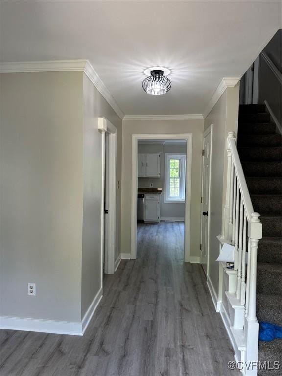 1916 Boardman Ln, Henrico, VA 23238 - hallway featuring wood finished floors, stairway, baseboards, and crown molding