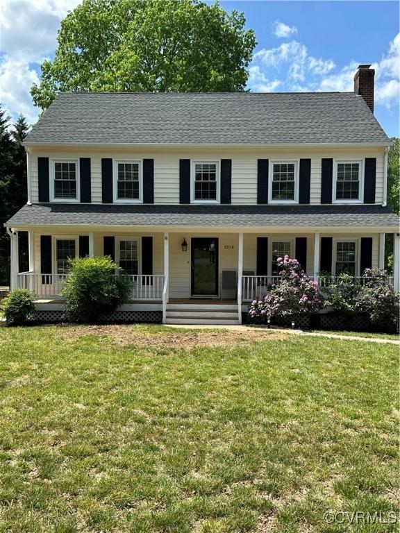 1916 Boardman Ln, Henrico, VA 23238 - colonial-style house with a chimney, covered porch, and a front yard
