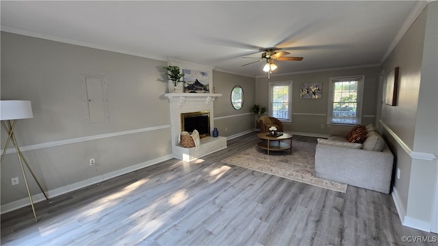 1916 Boardman Ln, Henrico, VA 23238 - living area featuring crown molding, a ceiling fan, wood finished floors, baseboards, and a brick fireplace