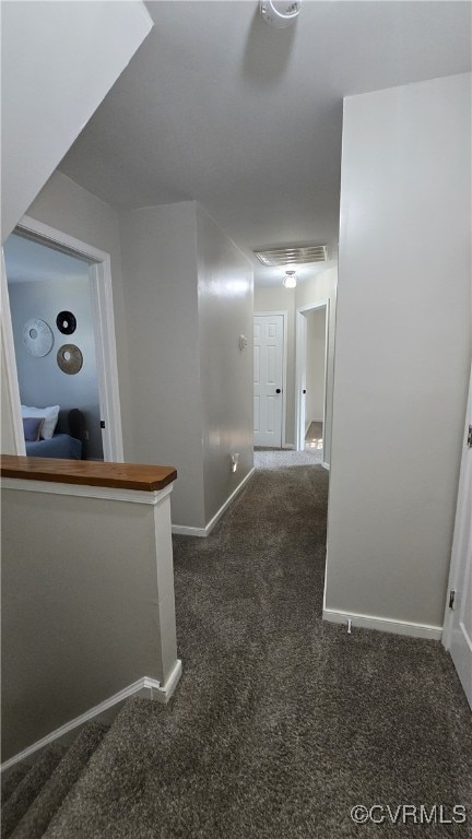 1916 Boardman Ln, Henrico, VA 23238 - hall featuring dark colored carpet and baseboards