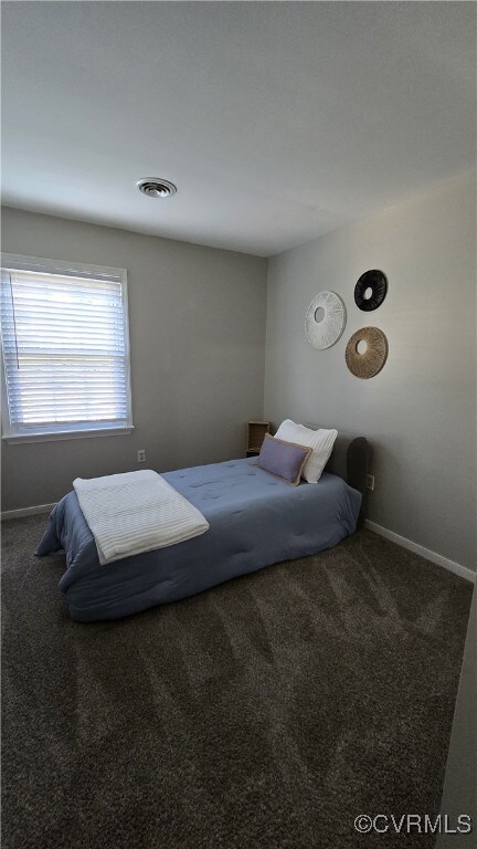 1916 Boardman Ln, Henrico, VA 23238 - carpeted bedroom featuring baseboards
