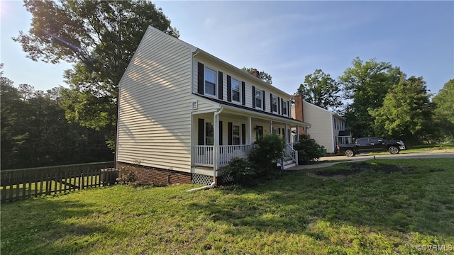 1916 Boardman Ln, Henrico, VA 23238 - view of side of property featuring a porch, cooling unit, and a chimney