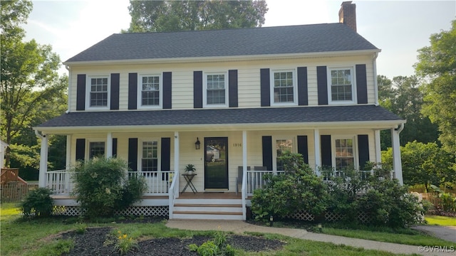 1916 Boardman Ln, Henrico, VA 23238 - colonial inspired home with a chimney, a porch, and a shingled roof