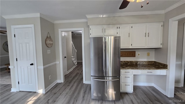 1916 Boardman Ln, Henrico, VA 23238 - kitchen with freestanding refrigerator, wood finished floors, white cabinetry, a ceiling fan, and dark stone counters