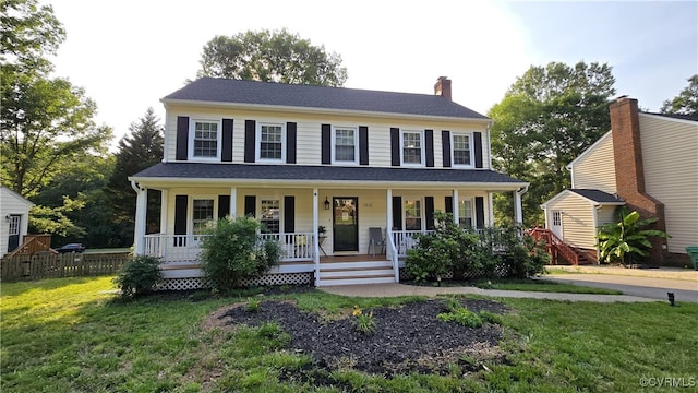 1916 Boardman Ln, Henrico, VA 23238 - colonial home featuring covered porch and a chimney