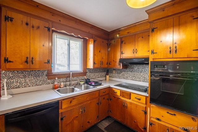 400 E California Ave, Crewe, VA 23930 - kitchen featuring a sink, backsplash, under cabinet range hood, and black appliances