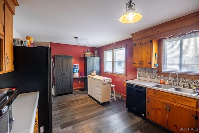 400 E California Ave, Crewe, VA 23930 - kitchen featuring brown cabinetry, dark wood-style floors, a sink, and black appliances