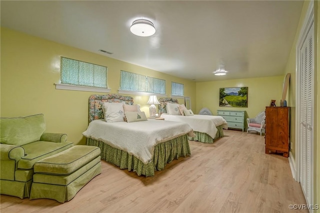 bedroom featuring wood finished floors