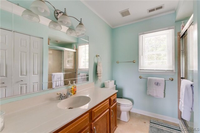 bathroom with vanity, visible vents, and a shower stall