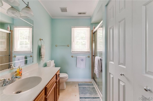 full bath featuring a shower stall, crown molding, vanity, and visible vents