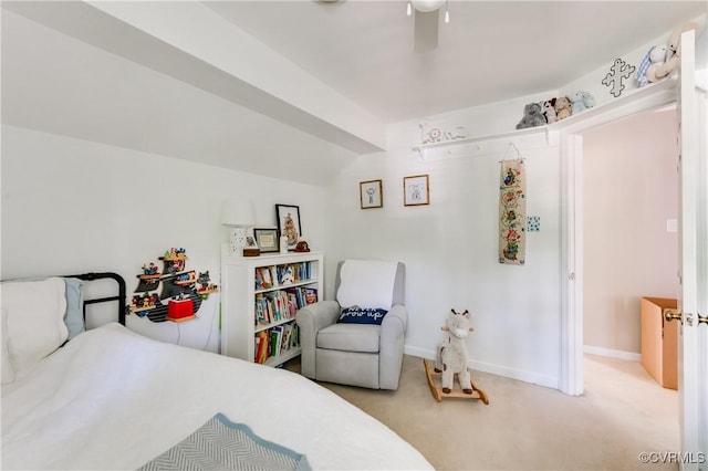 carpeted bedroom featuring baseboards and ceiling fan