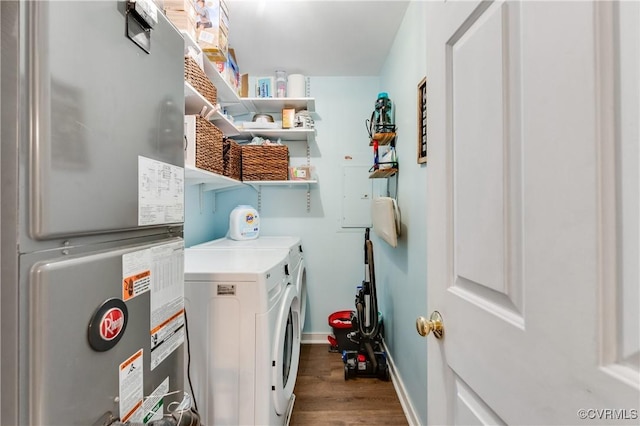 laundry room featuring heating unit, washing machine and dryer, laundry area, baseboards, and dark wood-style flooring