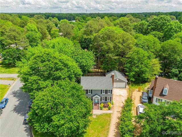 bird's eye view featuring a view of trees