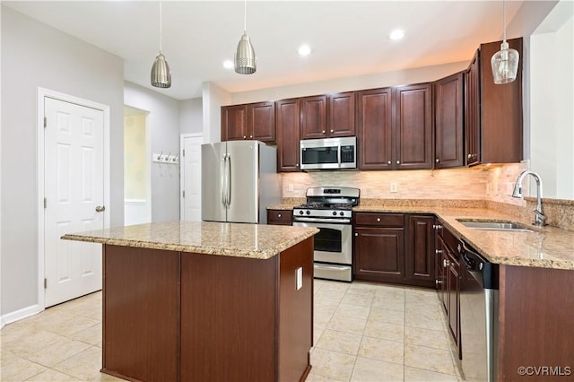 3713 Spratling Way, Chesterfield, VA 23237 - kitchen featuring light stone counters, a sink, backsplash, light tile patterned floors, and stainless steel appliances