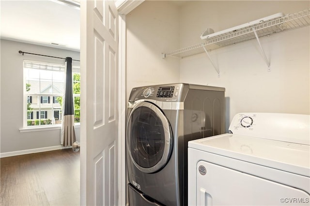 3713 Spratling Way, Chesterfield, VA 23237 - washroom featuring separate washer and dryer, laundry area, baseboards, and wood finished floors