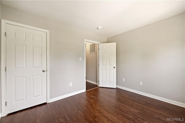 3713 Spratling Way, Chesterfield, VA 23237 - unfurnished bedroom with baseboards and dark wood-style floors