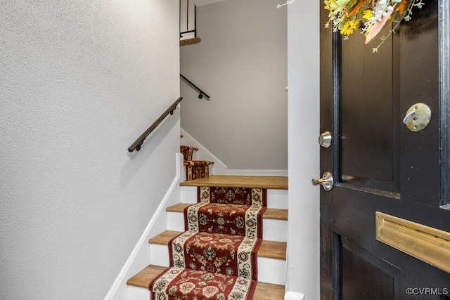 entryway featuring stairs