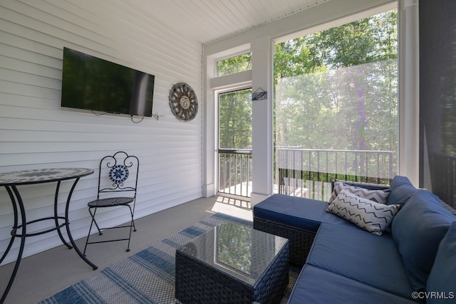 sunroom / solarium with outdoor lounge area