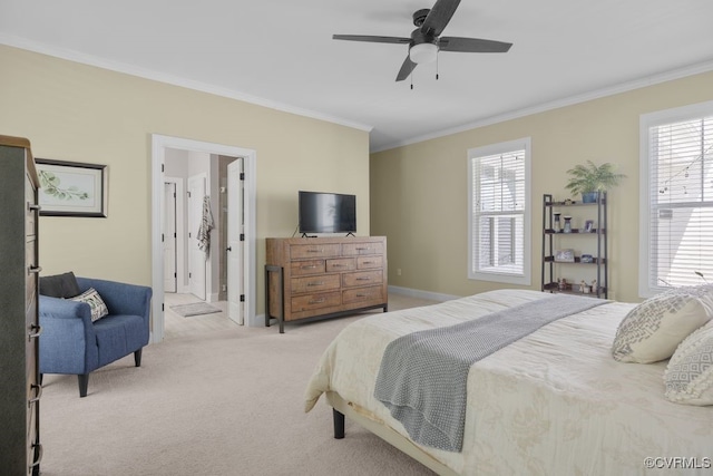 bedroom featuring baseboards, ornamental molding, carpet flooring, and multiple windows