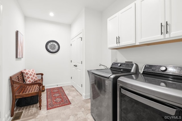 laundry area with cabinet space, washer and dryer, recessed lighting, baseboards, and visible vents