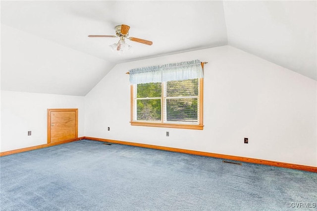 bonus room with carpet flooring, baseboards, and lofted ceiling