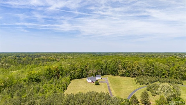 bird's eye view with a forest view