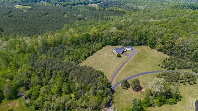 bird's eye view with a forest view