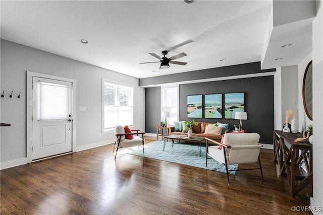 living room with baseboards, recessed lighting, ceiling fan, and wood finished floors
