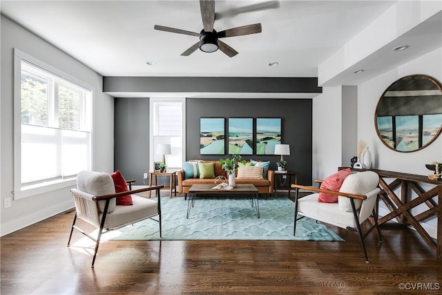 living area with recessed lighting, a ceiling fan, baseboards, and wood finished floors