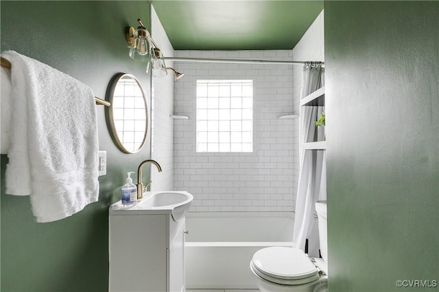 bathroom with vanity, toilet, and shower / washtub combination