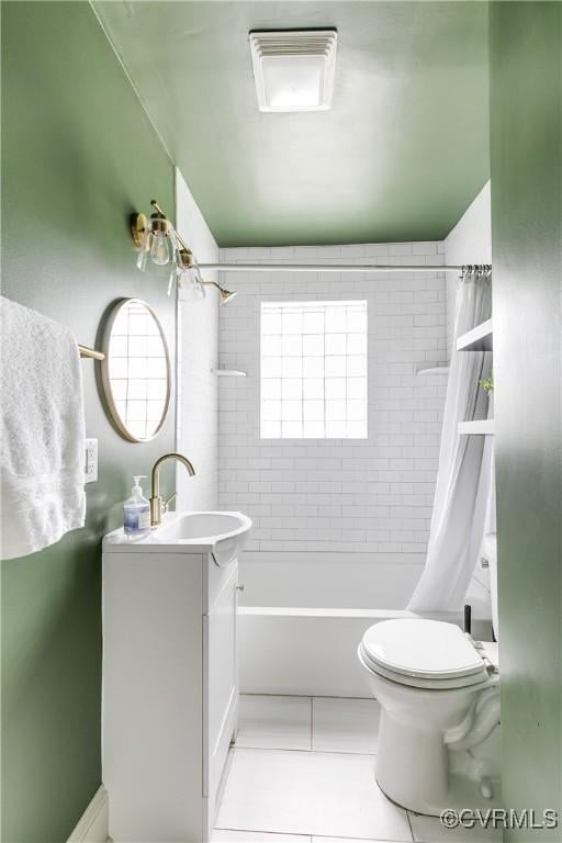 full bath featuring vanity, tile patterned flooring, shower / bath combination with curtain, and toilet