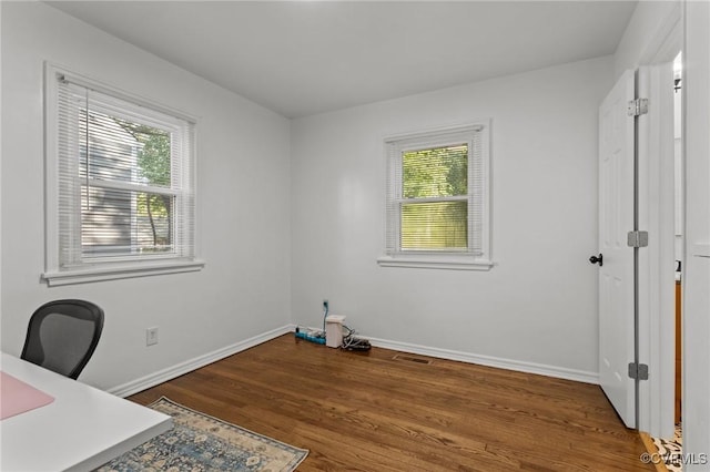 1712 Halifax Ave, Richmond, VA 23224 - unfurnished office with baseboards and wood finished floors
